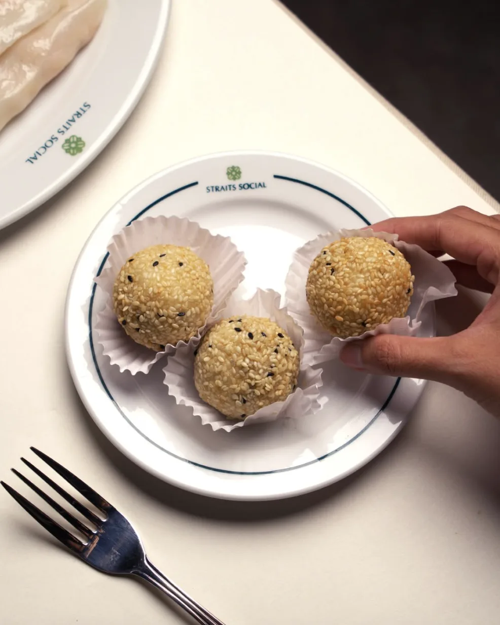 Three sesame balls on a Straits Social plate